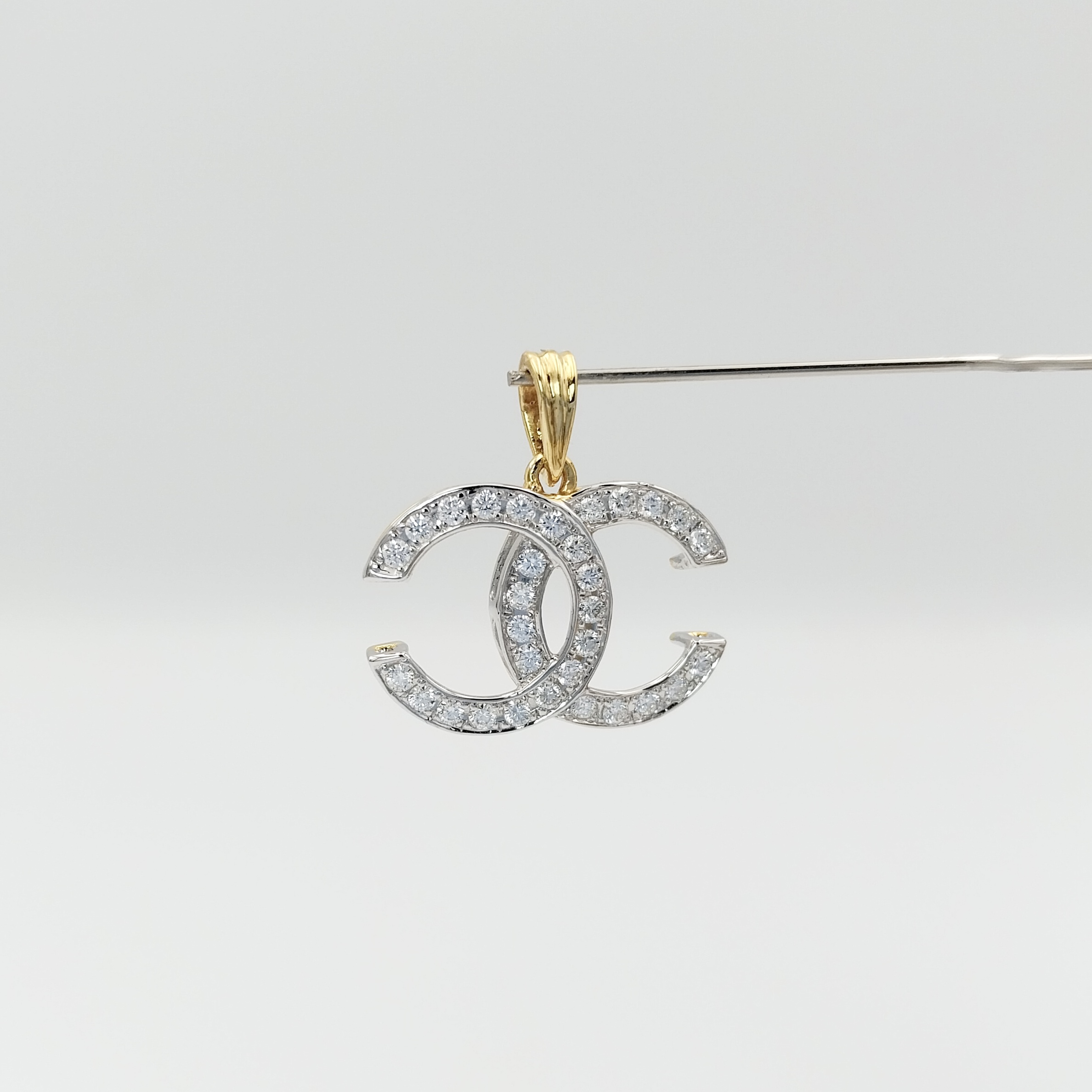 Chanel logo diamond pendent